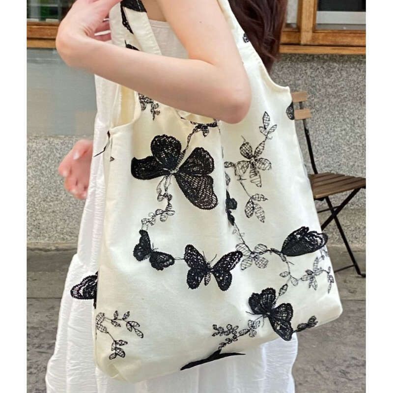 Sac à main en toile brodée papillon tridimensionnelle, grande capacité, tendance, polyvalent, pour les loisirs au quotidien, nouvelle collection 2025_voghion.com