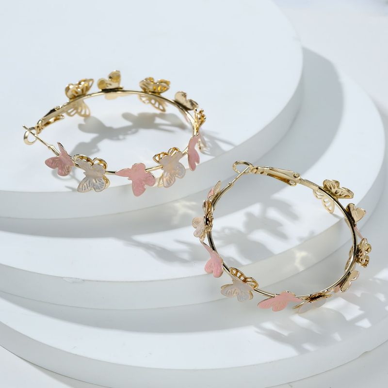 European Fashion Light Luxury Style Personality Pink And White Multiple Butterfly Flying Earrings Hollow Multi Layer Design Large Circle Ear Hooks_voghion.com