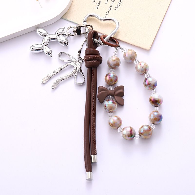 Bag Pendant Acrylic Bird's Nest Beaded Bag Decorative Pendant, Exquisite And Creative Pu Leather Rope Bow Pendant_voghion.com