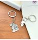 Portachiavi in acciaio inossidabile 304 con ciondolo a forma di coniglio e carota, stile coppia, un paio di simpatici cartoni animati._voghion.com