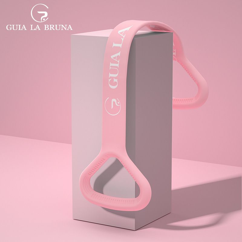 Aparelho de ginástica doméstico em formato de 8 com faixa elástica de resistência para abrir os ombros, costas e alongar os braços._voghion.com