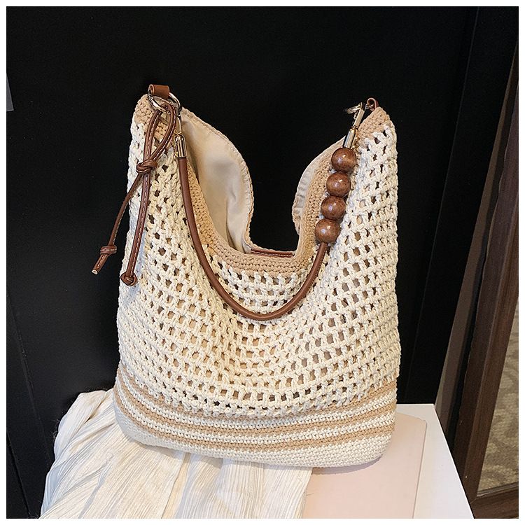 Knitted Hollow Design Single Shoulder For Women 2025 Spring Summer New Large Capacity Woven Crossbody Pastoral Beach Bag_voghion.com