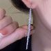 Silver ear line temperament long Galaxy tassel fashionable niche design high-end versatile new earrings_voghion.com