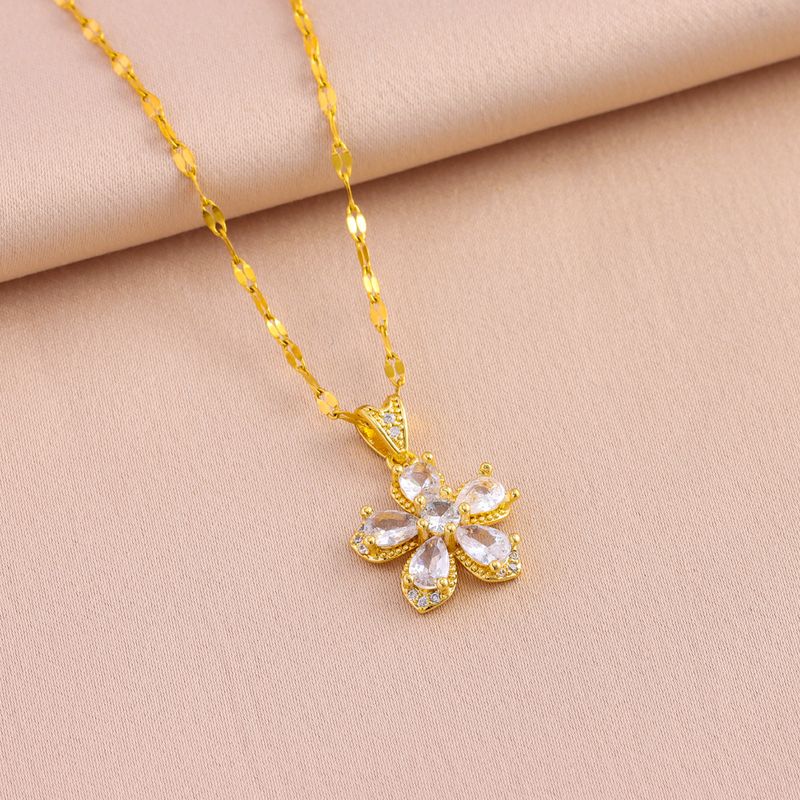 Nuovo set di orecchini con ciondolo a forma di fiore a sei valvole in zircone retrò di alta qualità_voghion.com