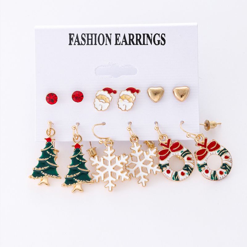 Juego de pendientes navideños con diseño de Papá Noel: pendientes colgantes de copo de nieve y árbol de Navidad esmaltados con dibujos animados para mujer, joyería para fiestas._voghion.com