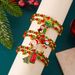 Braccialetto di perline di cristallo rosso verde con albero di Natale di Babbo Natale, versatile, alla moda, nuovo stile europeo e americano._voghion.com