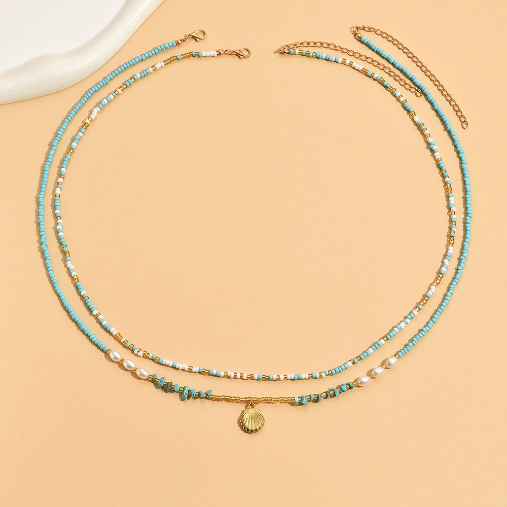 DZ0360 Chaîne de taille simple en perles de riz pour femme, style pastoral créatif_voghion.com