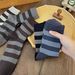 Crew Socks Gestreifte Kaschmirsocken für Herren für Herbst und Winter, vielseitig und lässig, weiche und klebrige Socken, modische kaffeefarbene Florsocken_voghion.com