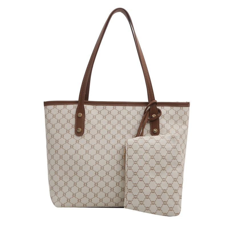 Simple and stylish handbag women in spring 2024, trendy tote for commuting, large capacity hand-held shoulder bag_voghion.com
