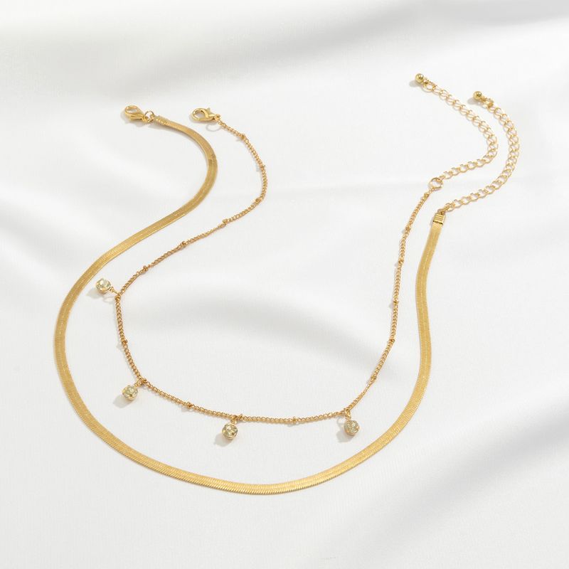 Collana versatile alla moda con catena a serpente a doppio strato con strass lucidi e stile a fascia impilata._voghion.com