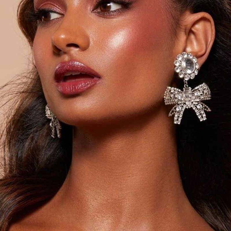 Orecchini pendenti con fiocco esagerato, eleganti accessori per le donne_voghion.com