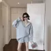 Ensemble deux pièces décontracté pour femme Dongdaemun : sweat-shirt à capuche ample et amincissant, short à jambes larges et cordon de serrage, idéal pour le début de l'automne._voghion.com