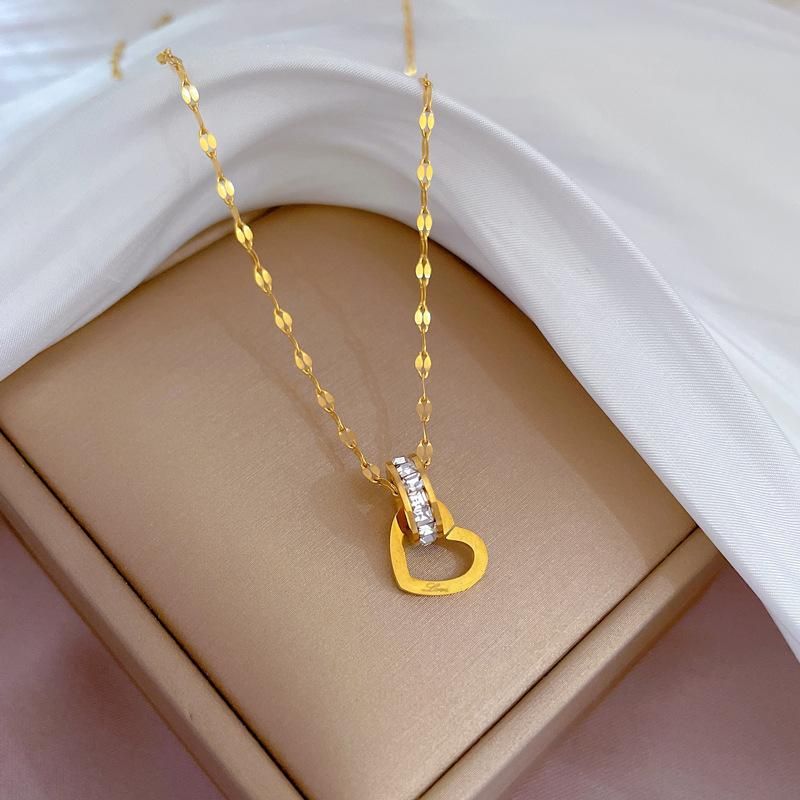 Naszyjnik ze stali nierdzewnej Interlock Circle Heart w stylu minimalistycznym Ins Style Charm łańcuszek obojczykowy dla kobiet łańcuszek na szyję biżuteria prezent na przyjęcie_voghion.com