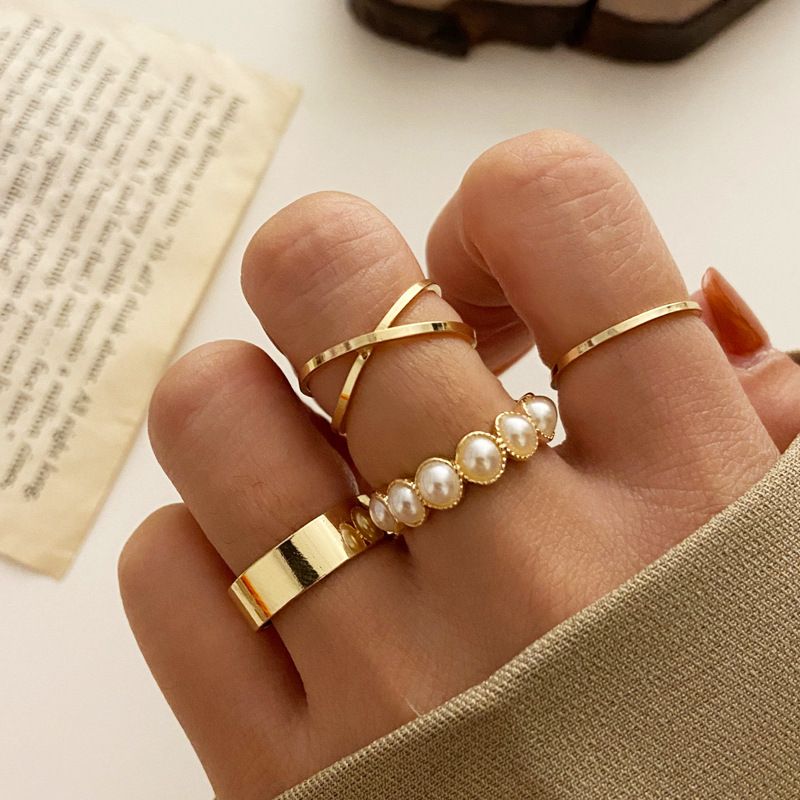 Vierteiliges Set mit Retro-Perlenringen und Intarsien_voghion.com