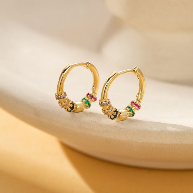 Eenvoudige en schattige oorbellen Zirkonia bloem ring oor gesp kleur Zirkonium ring koperen oorbellen_voghion.com