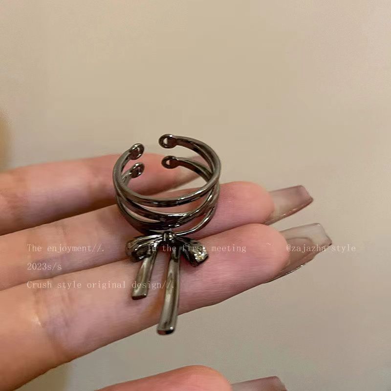 Cold aloof French bow and ribbon opening, female niche design with advanced adjustable index finger ring, unique_voghion.com