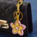 Portachiavi con piccolo fiore alla moda da donna, con ciondolo personalizzato in PU colorato per borsa per bambini_voghion.com
