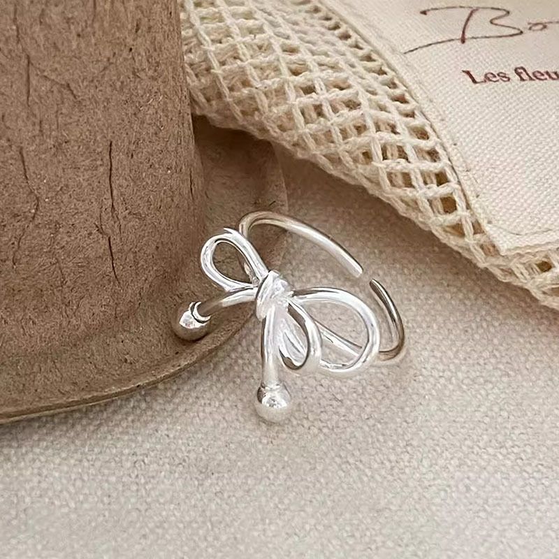 S Pure Silver Hollow Bowknot For Women, Ins Summer Simple High-end Irregular Line Open Ring_voghion.com