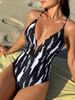 2025 New One-Piece Swimsuit Printed High-End Hollow Out With Chest Pad Beach Hot Spring Halter Neck Women's Swimwear_voghion.com