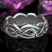 Anello con topazio celtico e totem del lupo tinto di nero_voghion.com