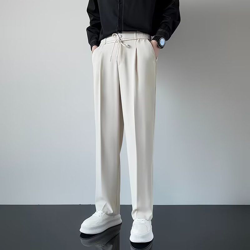 Calças elásticas de botão duplo para roupas masculinas, casuais e versáteis, calças casuais com sensação de linha para homens, calças de terno soltas bonitas e modernas_voghion.com