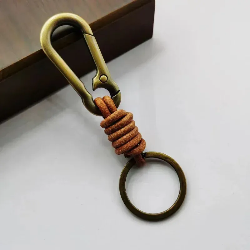 Portachiavi in vera pelle, accessori di alta qualità, con fibbia a molla in metallo, ciondolo in pelle di mucca vintage intrecciata, portachiavi 2407_voghion.com