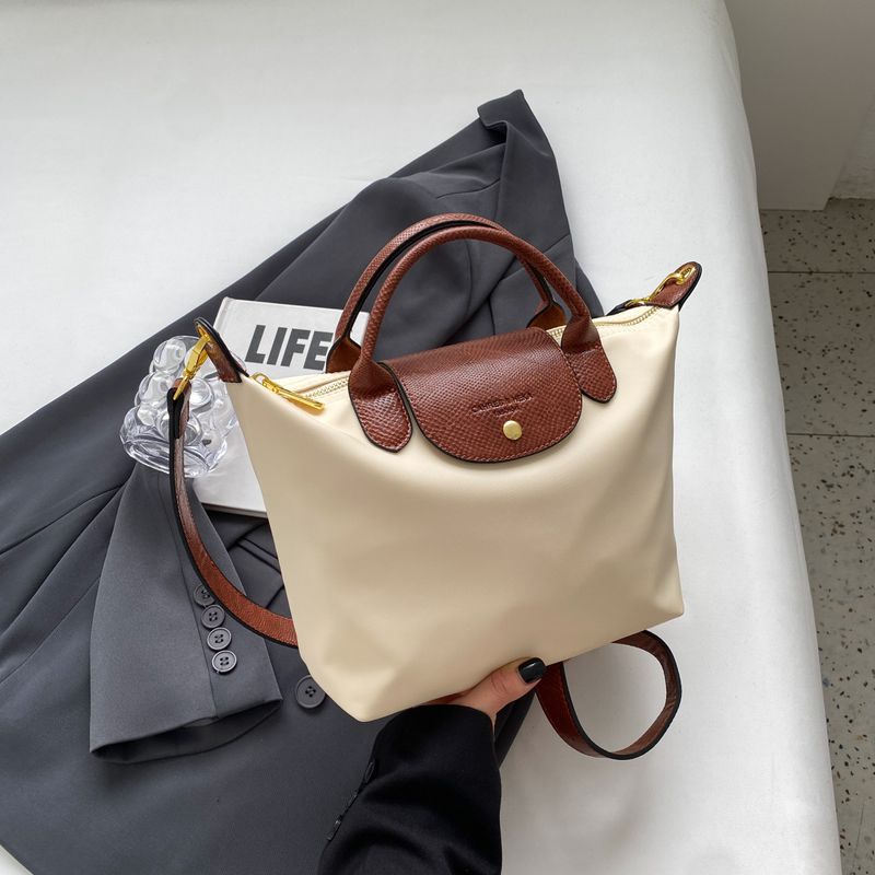 2024 Neue Oxford Bun Dragon Bags Xiang Damen Textur Mode Spleißen Knödel Tasche Einfache Handtasche_voghion.com