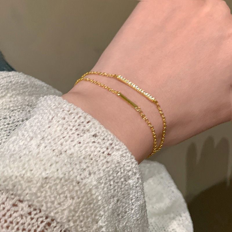 Titanstahl verblasst nicht in der Trendnische High-End Light Luxury Gold Sugar Cube Smaragd vielseitiges exquisites Armband für Damen im Sommer_voghion.com