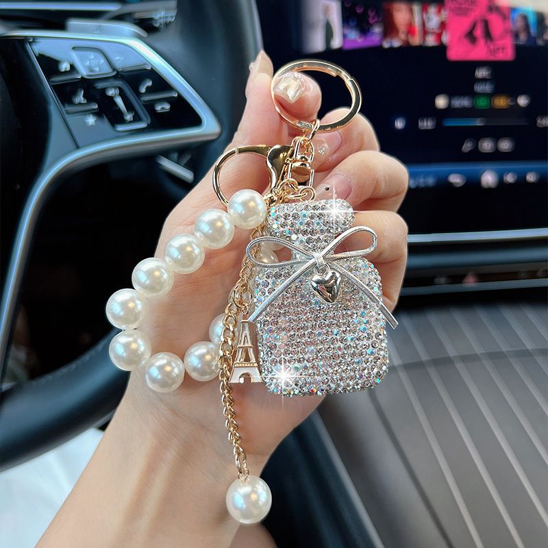 Koreanische Version Neue Intarsien Diamant Bogen Keychain Perle Farbverlauf Parfüm Flasche Tasche Mode Anhänger_voghion.com