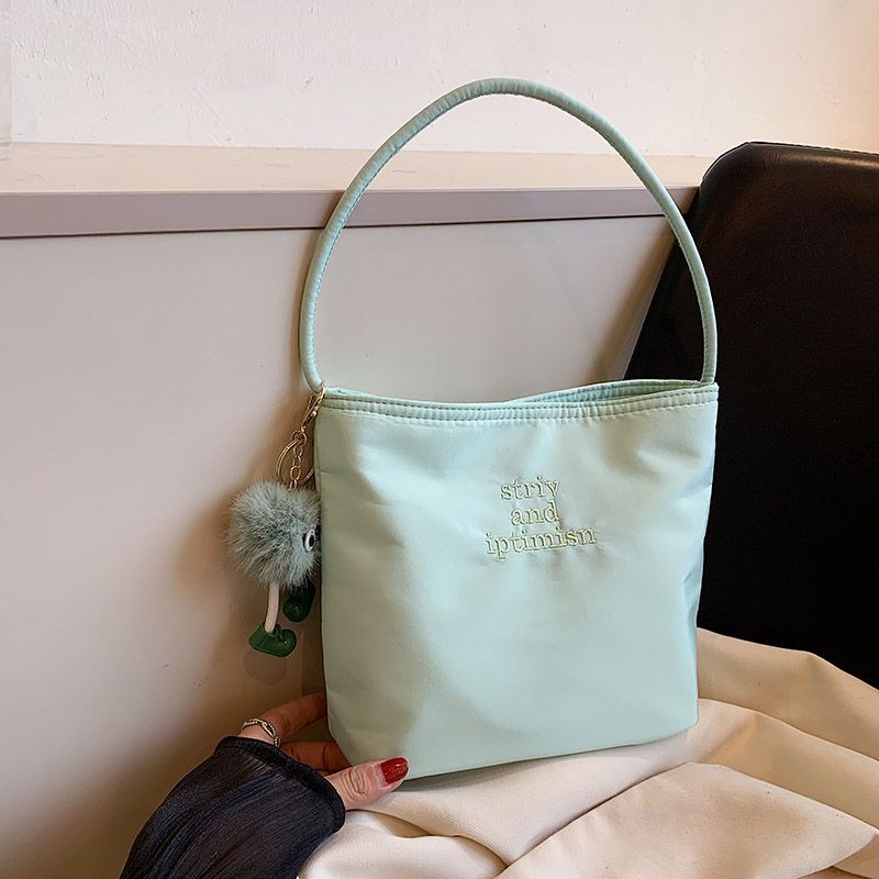 FOUR ONE Borsa a tracolla semplice casual da pendolare, borsa a secchiello in nylon ricamata con lettere di nicchia coreane_voghion.com