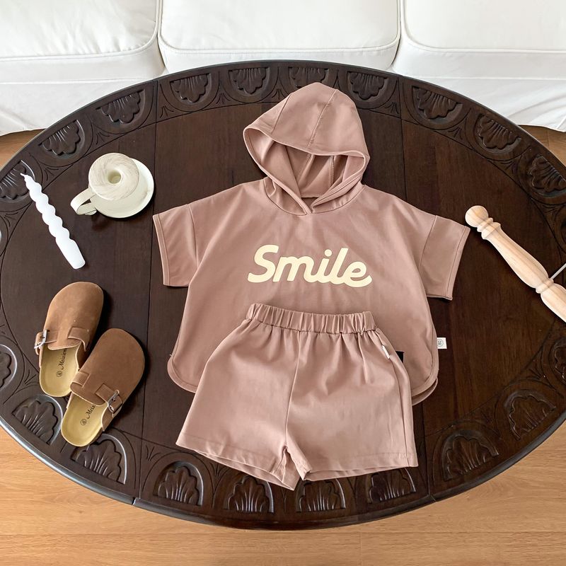 Vêtements d'été pour enfants 2024, short à manches courtes imprimé lettre pour garçons et filles, ensemble deux pièces à capuche fine_voghion.com
