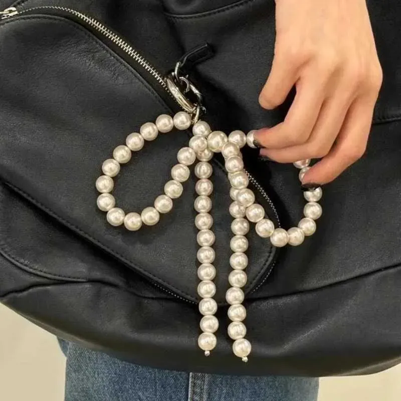 Fashionable pearl bow sweet and cute pendant decoration keychain charm wallet backpack handbag Y241121_voghion.com