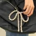 Fashionable pearl bow sweet and cute pendant decoration keychain charm wallet backpack handbag Y241121_voghion.com