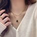 Double Heart-shaped Black Pendant For Girls With Modern Temperament, Layered Sweater Chain Lock, Bone Chain, Fashionable_voghion.com