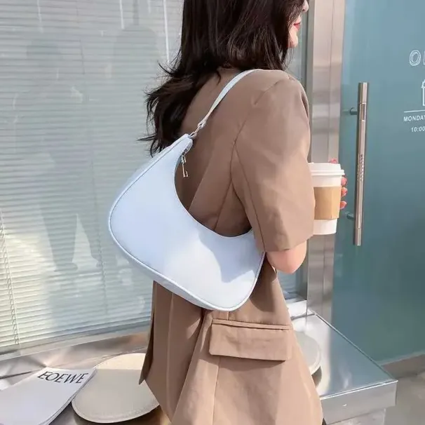 Wens Nyl Shoe 2023 Fi Solid Canvas Dumpg Unterarm Designer Tasche Cluh Geldbörse und Handtasche Y241026_voghion.com