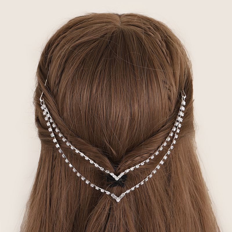 Eleganti e versatili copricapi pendenti, accessori da sposa con nappe multistrato tempestate di strass_voghion.com