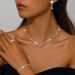 Ensemble de bijoux pour femmes, mode exquise, vente chaude, collier à griffes, boucles d'oreilles, bracelet, bague, ensemble quatre pièces, chaîne de clavicule entièrement en diamant, robe de soirée_voghion.com