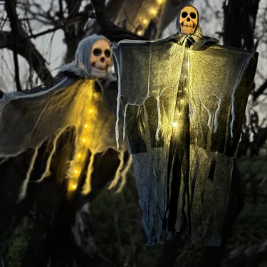 Glowing Skeleton Heads Hanging From The Outdoor Courtyard, Creating A Haunted Atmosphere With Ghostly Decorations For The Halloween Scene_voghion.com