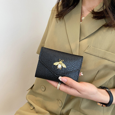 Cross-border small bee wallet female 2023 new short section small and thin section wallet 30% off niche solid color coin purse PU_voghion.com