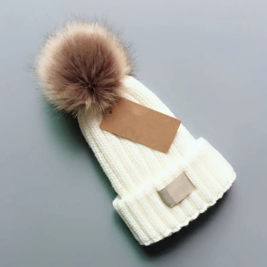 Luxury Fur Pom Poms Kid Hat Fashion Winter Hats For Kids Caps Baby Solid Color Designer Knitted Beanies adult size and child size Removable pom pom_voghion.com