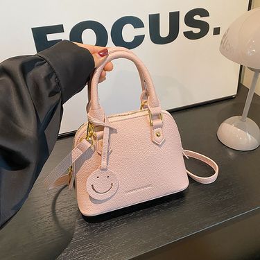 Trendy temperament solid color hand-held shell 2024 new high-end multi-color single shoulder crossbody women's bag_voghion.com