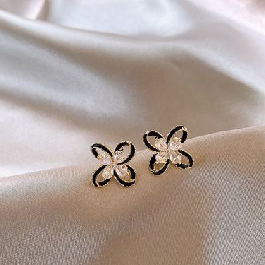 Drop Glaze Four-leaf Flower Hollow Full Diamond Stud Earrings Women's Unique Temperament Earrings Light Luxury High-end Earrings 2025 New Models_voghion.com