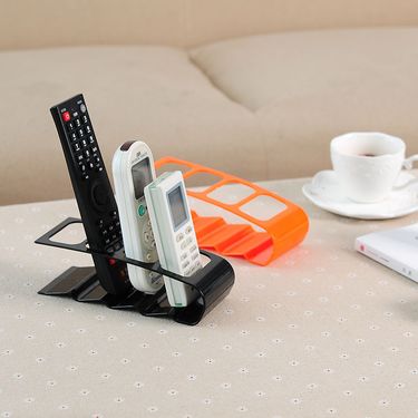 Creative plastic four-grid remote control storage rack desktop storage rack storage seat_voghion.com