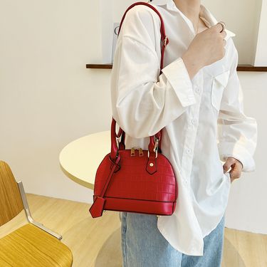 European and American fashion retro stone pattern simple shell bag 2024 new niche design shoulder bag crossbody women's bag trend_voghion.com
