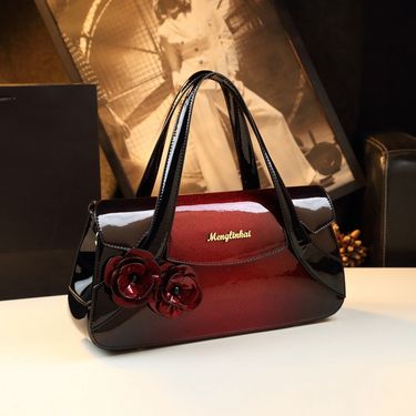 Hong Kong trendy women's fashionable soft leather atmospheric handbag 2024 new middle-aged mother single shoulder_voghion.com