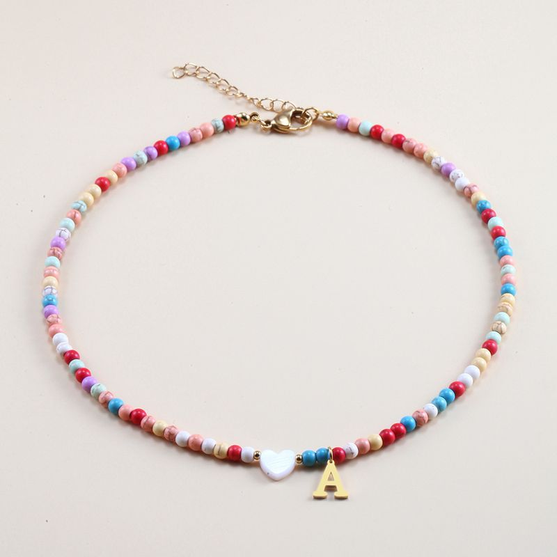 Vendita calda transfrontaliera in acciaio inossidabile oro 26 lettera inglese ciondolo conchiglia amore colore misto turchese collana fai da te clavicola_voghion.com