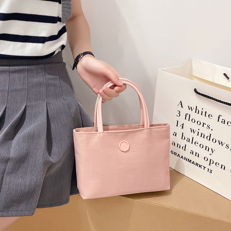 2022 Sommer Neue Canvas Handheld Mini Tote Mode Einfache Pendler Damentasche_voghion.com