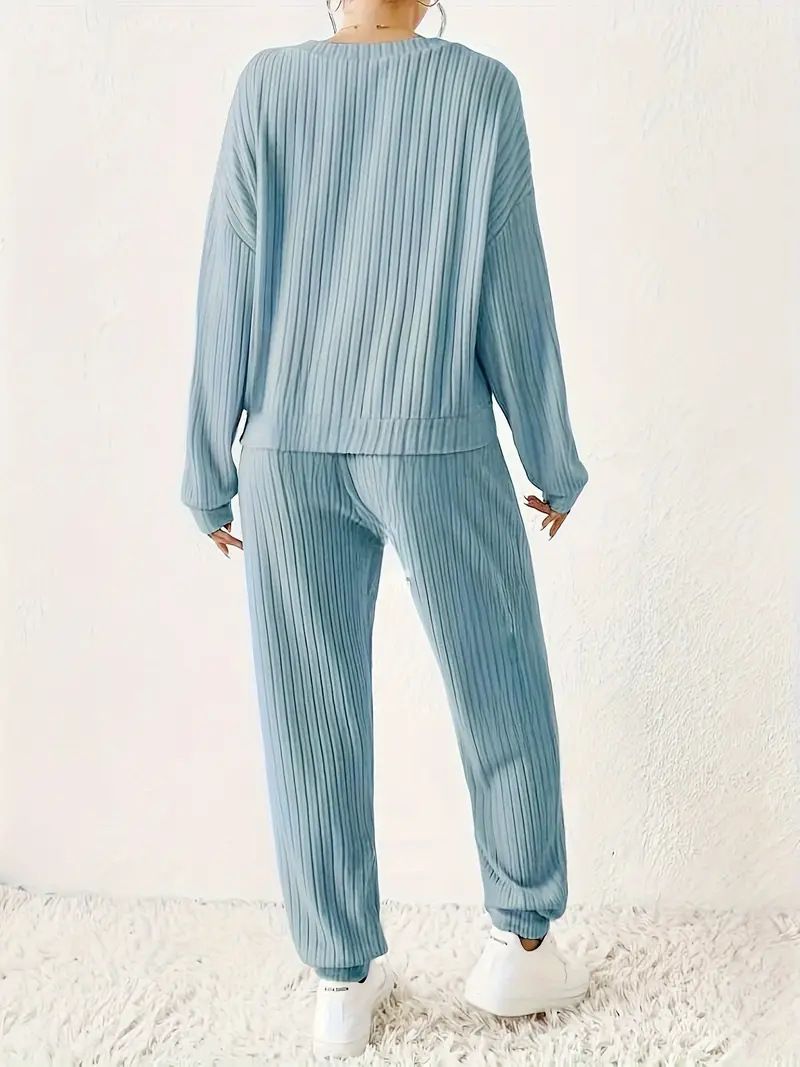 Completo da salotto minimalista in tinta unita – Top oversize con scollo a V e pantaloni larghi, completo casual da donna in due pezzi_voghion.com