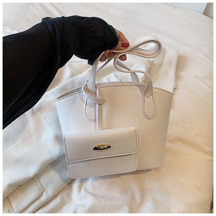 Borsa piccola portatile di moda estiva nuova borsa a secchiello casual semplice da donna 2023 borsa per ascelle suocera con trama di nicchia_voghion.com