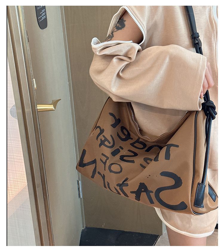 Women's Waterproof Nylon Handbag, 2025 Spring And Summer New Wave Graffiti Leisure Large-capacity Shoulder Bag_voghion.com